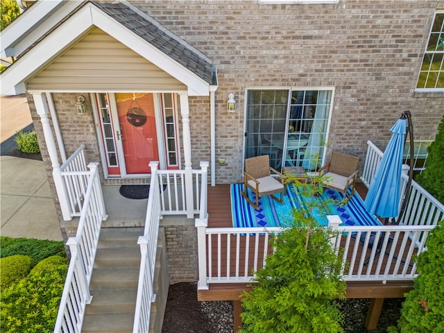 property entrance with covered porch