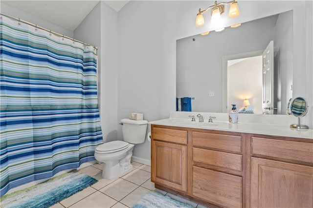 bathroom featuring tile patterned floors, a shower with curtain, toilet, and vanity