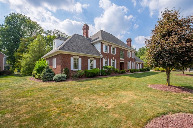 exterior space with a yard