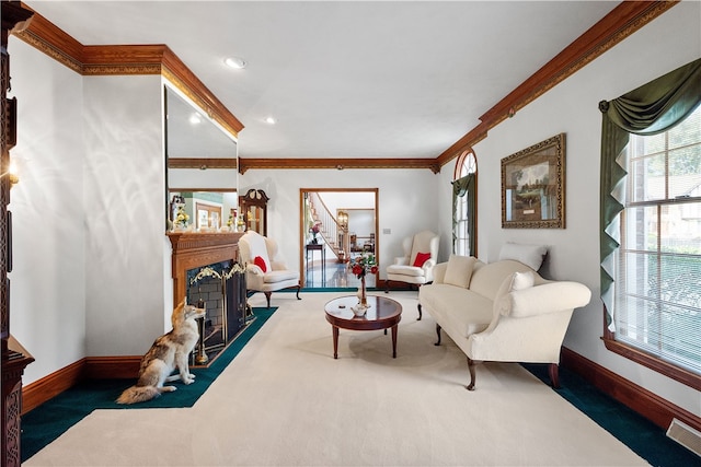 carpeted living room featuring crown molding