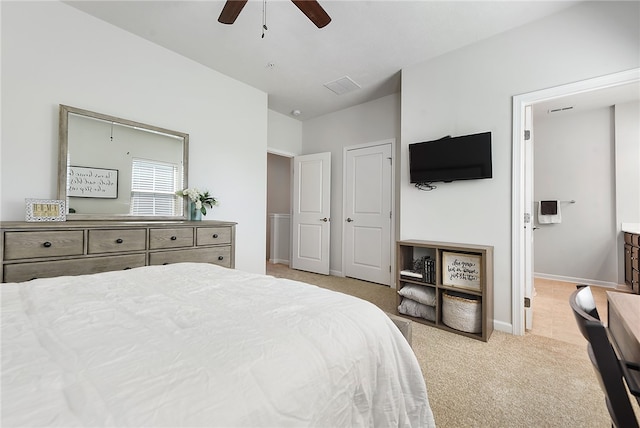 bedroom with light colored carpet and ceiling fan