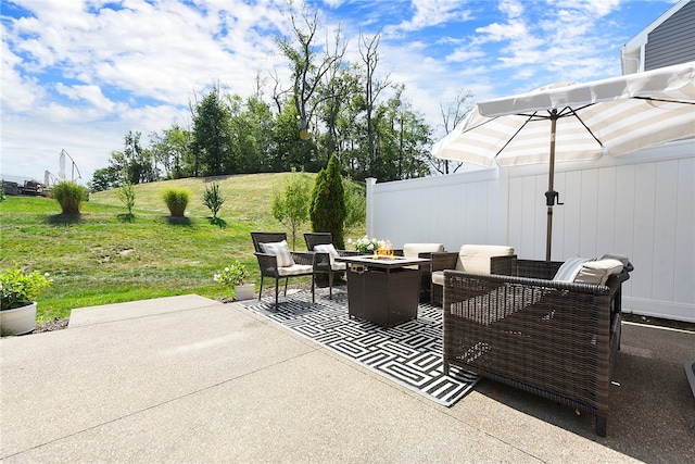 view of patio featuring an outdoor fire pit