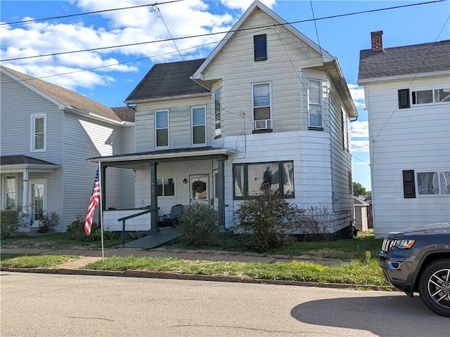 front facade featuring covered porch