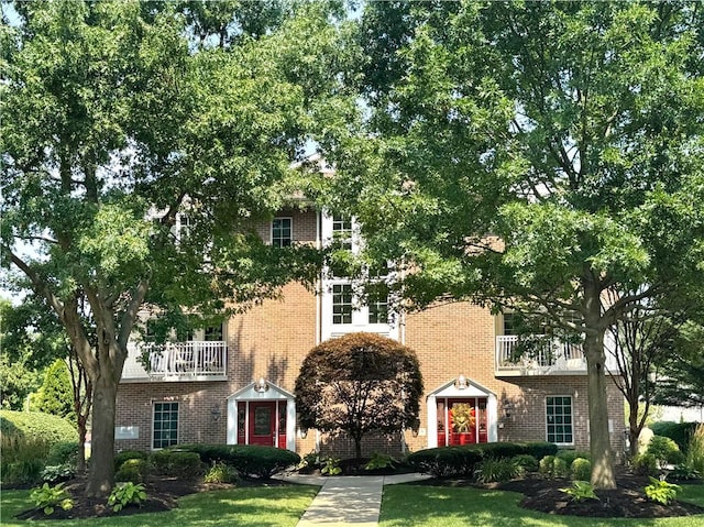 740 Turnpike St Unit 5, Beaver, PA 15009 - view of front of home with brick siding, a front lawn, and a balcony