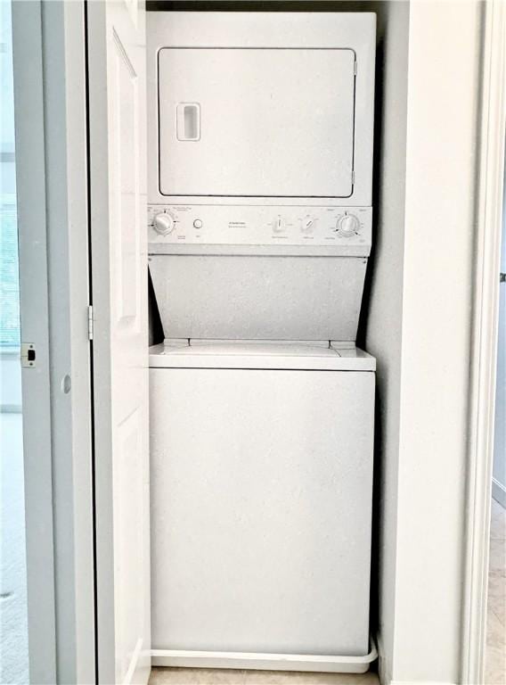 740 Turnpike St Unit 5, Beaver, PA 15009 - clothes washing area featuring stacked washer and clothes dryer and laundry area