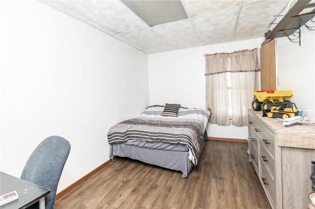 bedroom featuring dark hardwood / wood-style floors