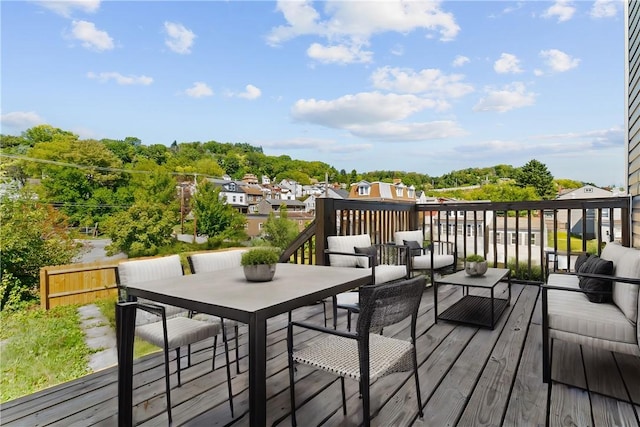 deck with an outdoor hangout area