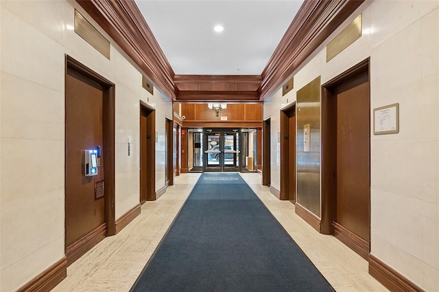 hallway with light carpet and ornamental molding