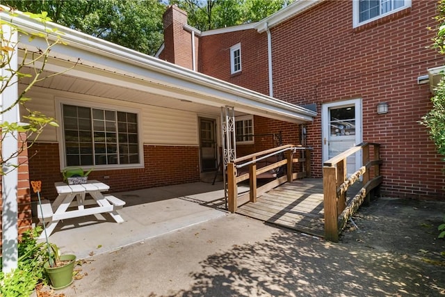 rear view of property featuring a patio