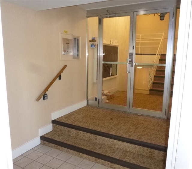 interior space with tile patterned floors