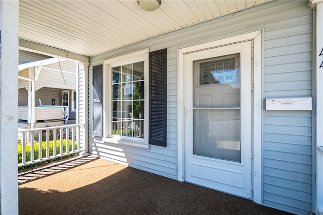 view of patio featuring a porch