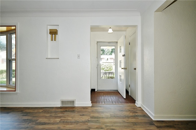 entryway with dark hardwood / wood-style floors