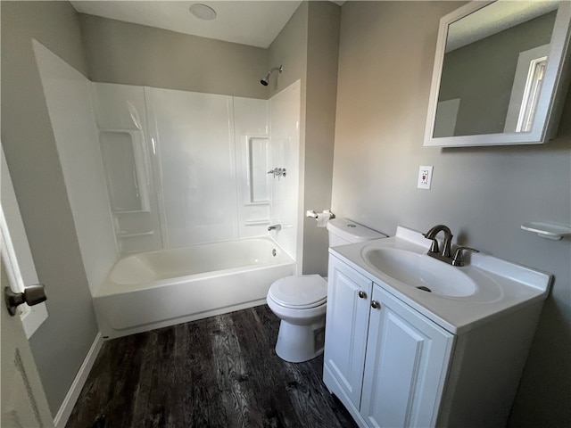 full bathroom featuring shower / bath combination, toilet, wood-type flooring, and vanity