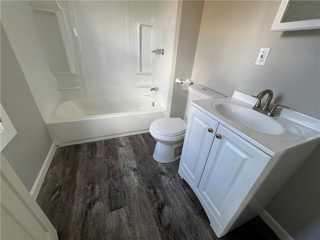 full bathroom featuring shower / bathtub combination, wood-type flooring, toilet, and vanity