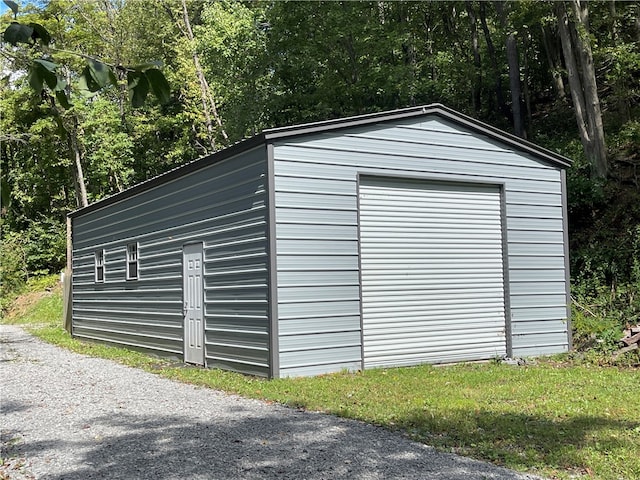 view of outbuilding with a garage