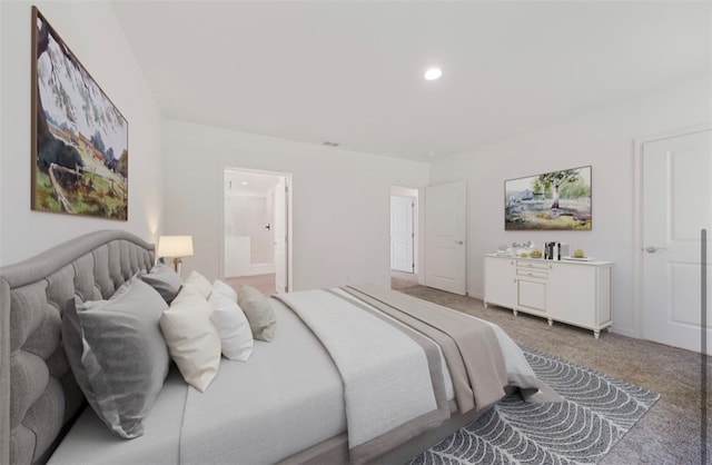 bedroom with carpet floors and ensuite bath