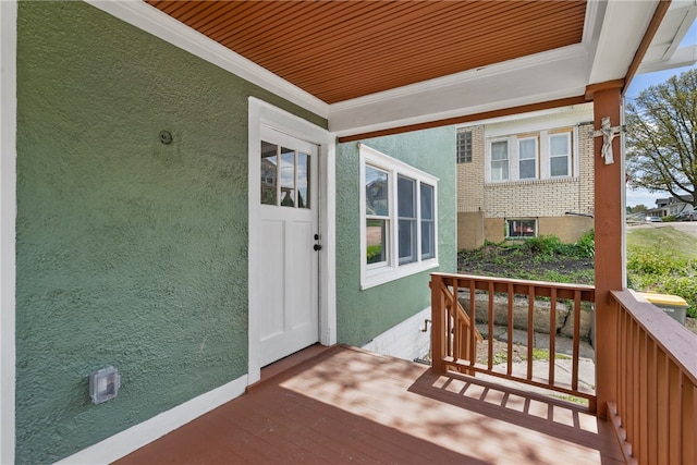 property entrance with covered porch