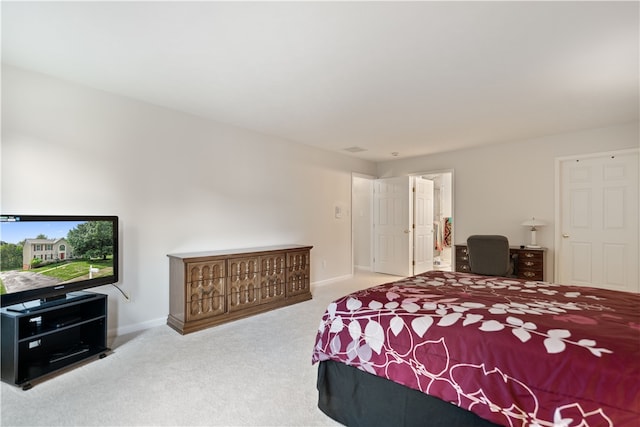 bedroom with light carpet