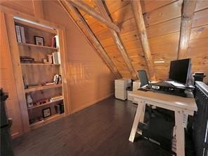 office with lofted ceiling, wood walls, dark hardwood / wood-style flooring, and wooden ceiling