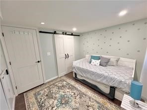 bedroom with a barn door