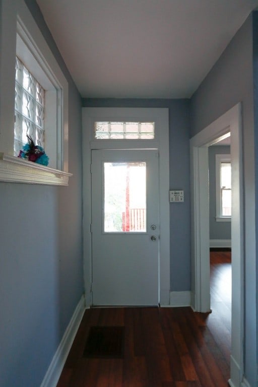 doorway featuring hardwood / wood-style flooring