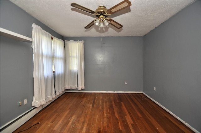 empty room with a textured ceiling, wood-type flooring, and ceiling fan