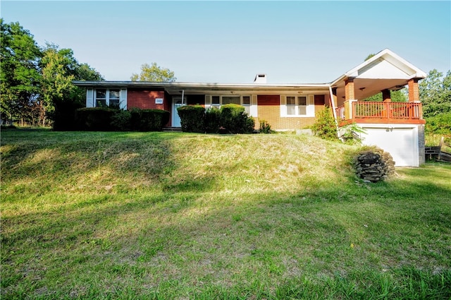 single story home with a garage and a front yard