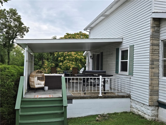 exterior space with a carport