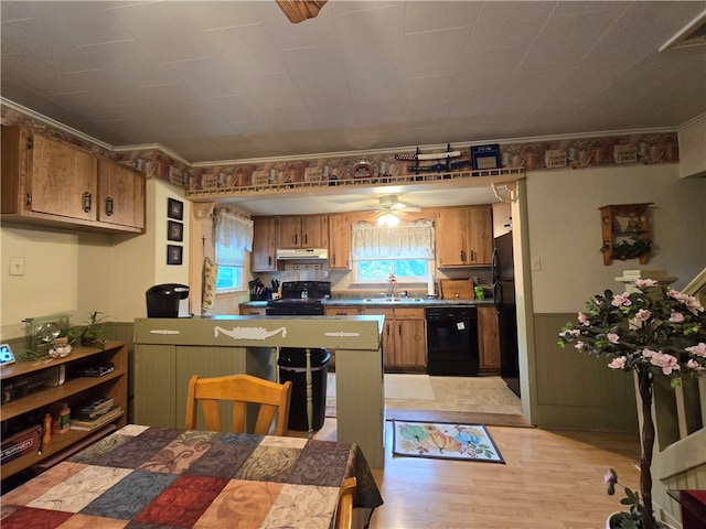 kitchen with black appliances, light hardwood / wood-style floors, ornamental molding, sink, and ceiling fan