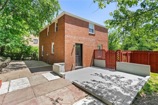 back of house featuring a patio