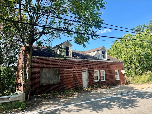 view of new england style home