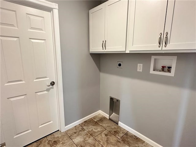 clothes washing area with hookup for a washing machine, cabinets, and hookup for an electric dryer