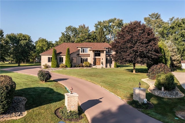 view of front of home with a front lawn