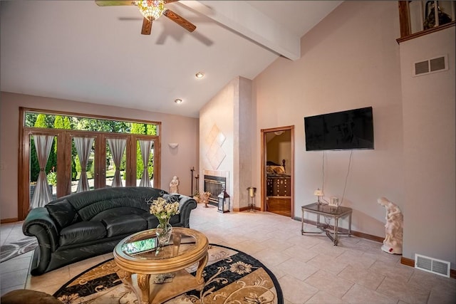 living room with baseboards, visible vents, high vaulted ceiling, a fireplace, and beamed ceiling