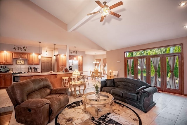 living room with light tile patterned floors, beamed ceiling, high vaulted ceiling, and ceiling fan