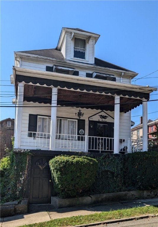 view of front of home featuring covered porch