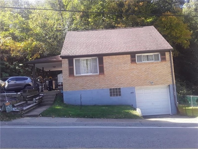 view of front of home with a garage