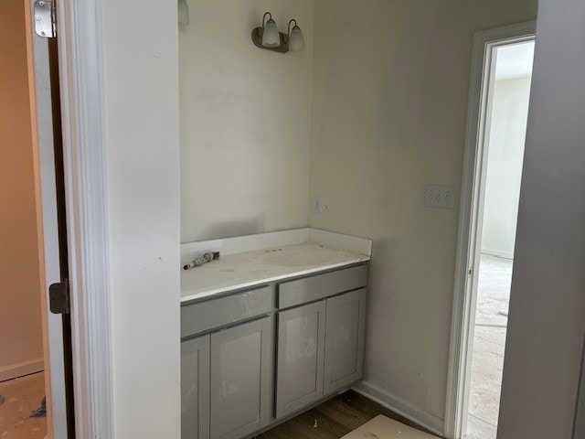 bathroom featuring vanity and wood-type flooring