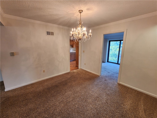 unfurnished dining area with crown molding, a notable chandelier, a textured ceiling, and dark carpet