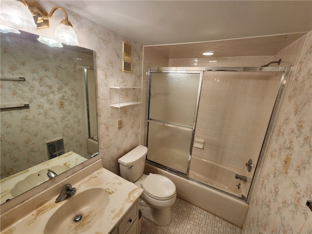 full bathroom featuring vanity, toilet, and enclosed tub / shower combo