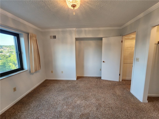 unfurnished bedroom featuring a closet, carpet flooring, and a textured ceiling