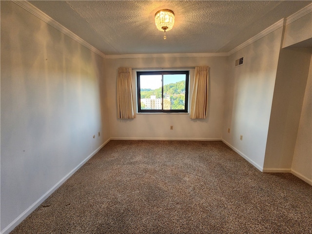 unfurnished room with ornamental molding, carpet floors, and a textured ceiling