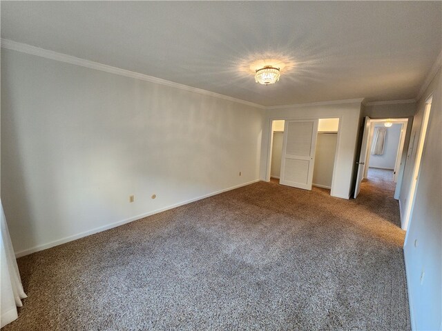 unfurnished bedroom featuring carpet and ornamental molding