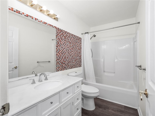 full bathroom featuring vanity, toilet, shower / tub combo with curtain, and hardwood / wood-style floors