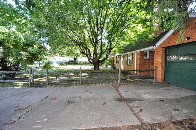 view of patio / terrace with a garage