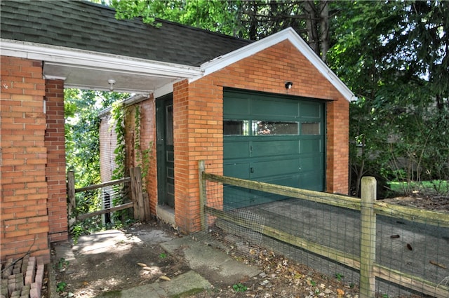 view of outbuilding featuring a garage