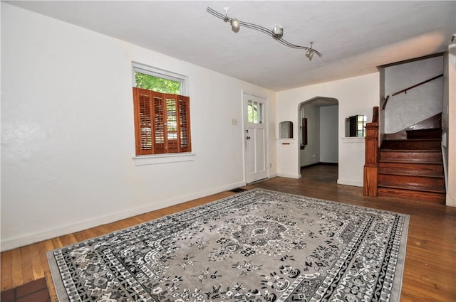 foyer entrance featuring wood-type flooring