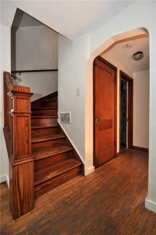 stairway with wood-type flooring