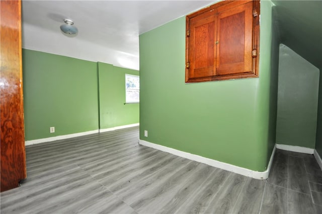 spare room featuring hardwood / wood-style floors