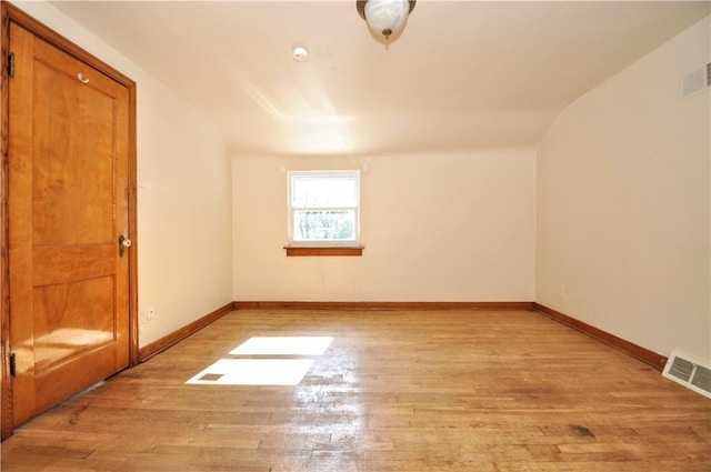 unfurnished room featuring light hardwood / wood-style floors